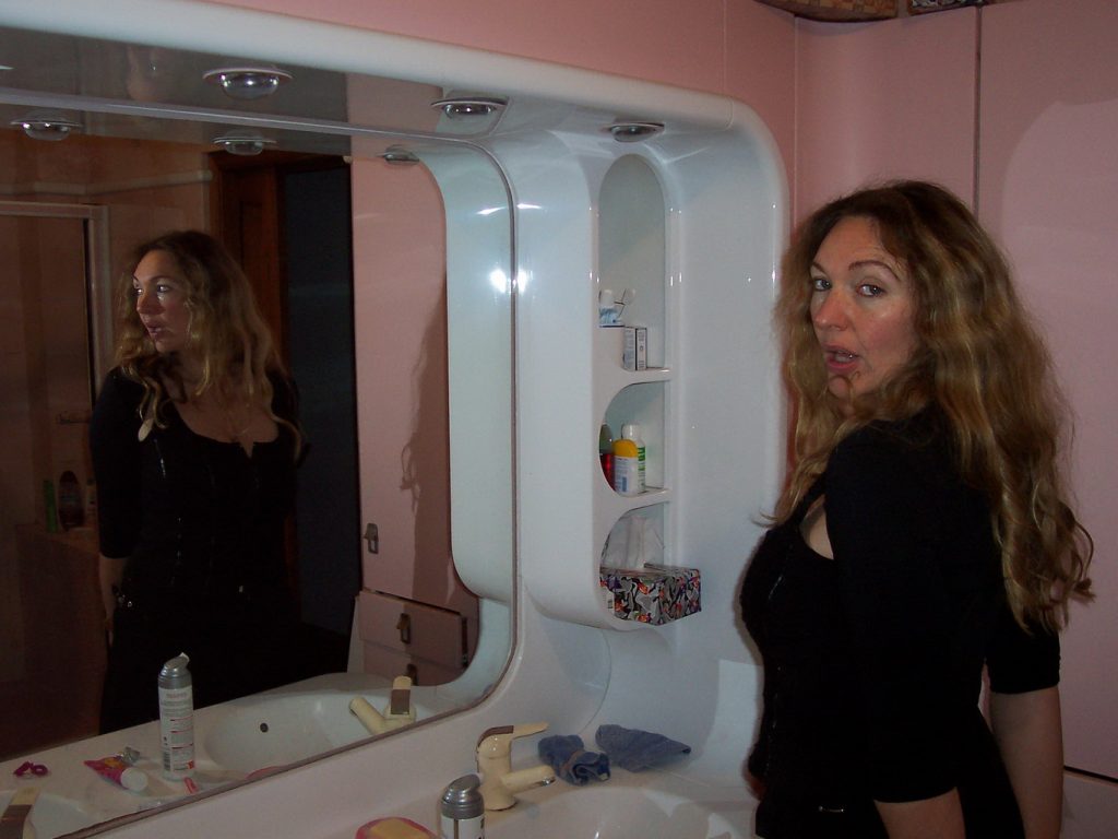 Sexy MILF Wife Posing In Front Of The Mirror While Getting Ready For The Evening