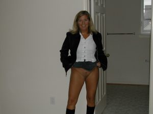 MeetLocalMILFs.Online - MILF Dating Site - Sexy And Elegant Blonde MILF Wife Lifting Her Mini Skirt And Showing Her Shaven MILF Pussy.