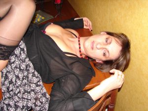 MeetLocalMILFs.Online - MILF Dating Site - Amateur Sexy Pic Of MILF Wife Showing Her Legs In Stockings And Her Nipple While Posing For Her Hubby.